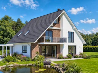 Massivhaus Born von TIMOWA Massivhäuser, Satteldach-Klassiker Außenansicht 1