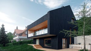 Satteldachhaus aus schwarzem Holz im modernen Design