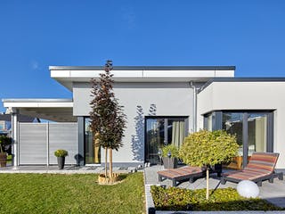 Massivhaus Ebert von AIM Hausbau, Bungalow Außenansicht 4