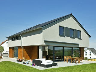 Massivhaus Ohlig von AIM Hausbau, Satteldach-Klassiker Außenansicht 1