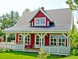 Fertighaus Arne 100 von AKOST Holzhäuser, Satteldach-Klassiker Außenansicht 2