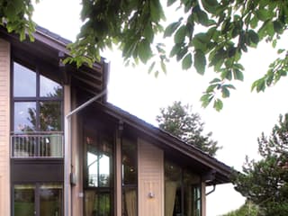 Fertighaus Bambus von Stommel Haus Schlüsselfertig ab 300000€, Blockhaus Außenansicht 2