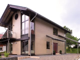 Fertighaus Bambus von Stommel Haus Schlüsselfertig ab 300000€, Blockhaus Außenansicht 7