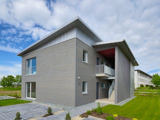 Fertighaus Mehrfamilienhaus Münch von Bau-Fritz - Mehrfamilienhäuser Schlüsselfertig ab 1015000€, Pultdachhaus Außenansicht 3