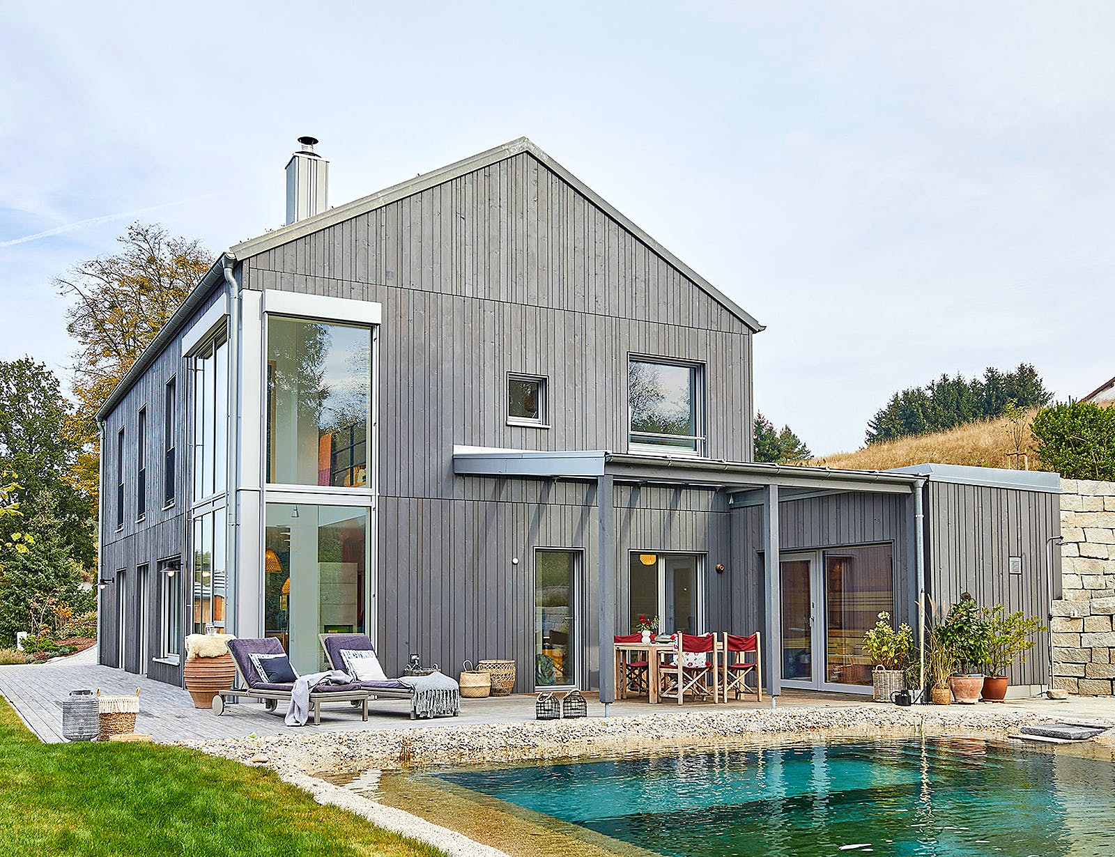 Fertighaus Haus am Wald - Kundenhaus von Bau-Fritz Schlüsselfertig ab 940000€, Satteldach-Klassiker Außenansicht 1