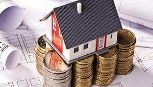 Modellhaus auf Geld