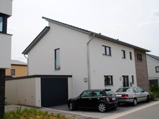 Fertighaus Beispielhaus 2 von CAL-Classic-Haus Schlüsselfertig ab 430000€, Satteldach-Klassiker Außenansicht 3