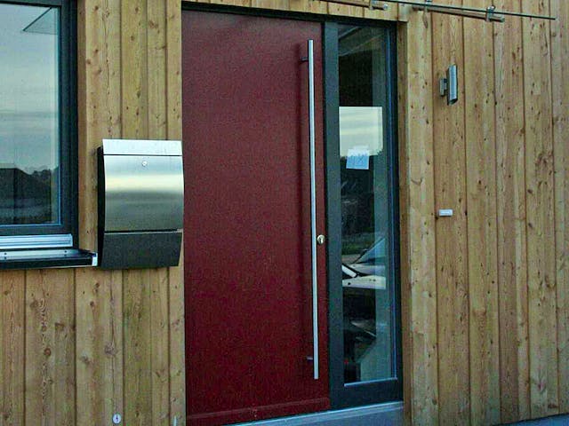 Fertighaus Birgit (KfW-Effizienzhaus 40 EE) von Dammann-Haus Schlüsselfertig ab 381300€, Pultdachhaus Außenansicht 2