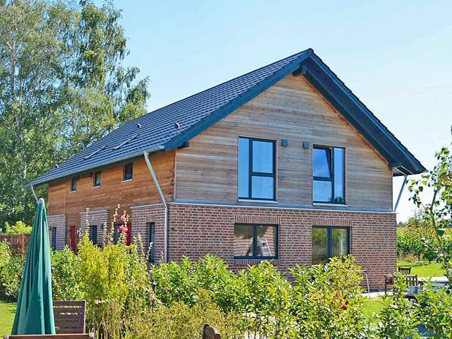 Fertighaus Julia 3 (KfW-Effizienzhaus 40 EE) von Dammann-Haus Schlüsselfertig ab 406500€, Satteldach-Klassiker Außenansicht 4