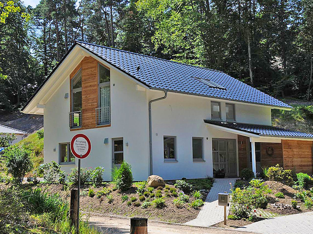 Fertighaus Jutta (KfW-Effizienzhaus 40 EE) von Dammann-Haus Schlüsselfertig ab 379200€, Satteldach-Klassiker Außenansicht 1