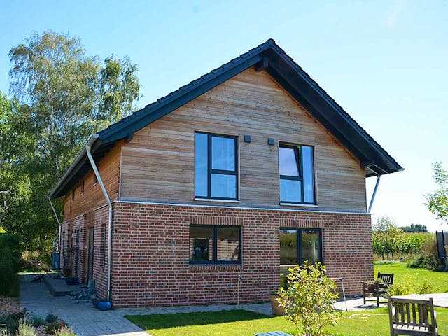 Fertighaus Jutta (KfW-Effizienzhaus 40 EE) von Dammann-Haus Schlüsselfertig ab 379200€, Satteldach-Klassiker Außenansicht 3