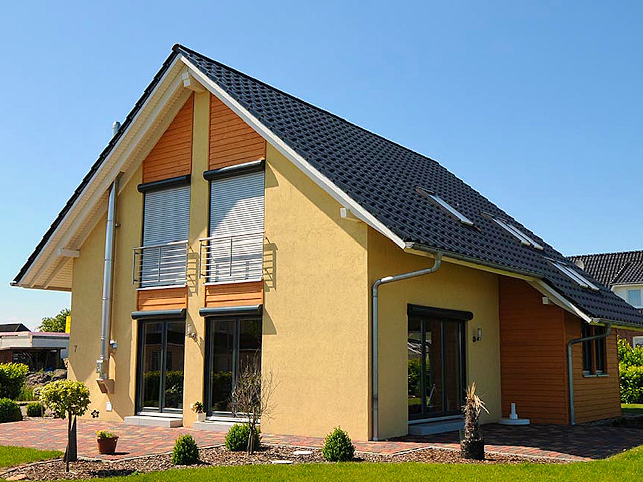 Fertighaus Steffy (KfW-Effizienzhaus 40 EE) von Dammann-Haus Schlüsselfertig ab 336800€, Satteldach-Klassiker Außenansicht 1