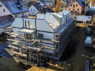 Massivhaus ALFA Mehrfamilienhaus M2 von Dennert Massivhaus - Mehrfamilien-, Reihen- & Doppelhaus, Außenansicht 2