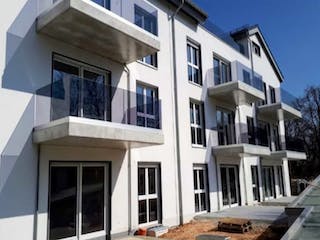 Massivhaus ALFA Mehrfamilienhaus M3 von Dennert Massivhaus - Mehrfamilien-, Reihen- & Doppelhaus, Außenansicht 1