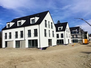 Massivhaus ALFA Reihenhaus R2 von Dennert Massivhaus - Mehrfamilien-, Reihen- & Doppelhaus, Außenansicht 3