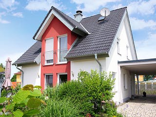 Massivhaus ICON 3 mit Quergiebel von Dennert Massivhaus Ausbauhaus ab 243800€, Satteldach-Klassiker Außenansicht 2