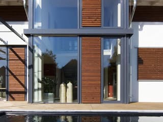 Blockhaus D168 MH Bad Vilbel von Frammelsberger R. Ingenieur-Holzbau, Satteldach-Klassiker Außenansicht 4