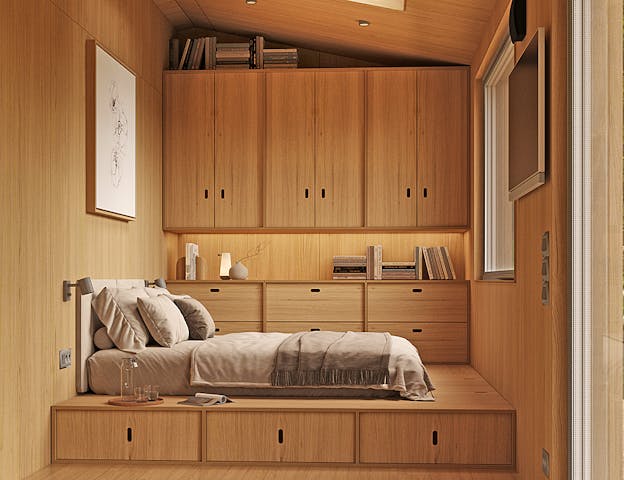 Schlafbereich im Tiny House mit Podestbett und Hängeschränken