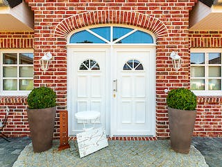 Massivhaus Friesenhaus 160 von ECO System HAUS, Satteldach-Klassiker Außenansicht 3