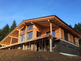 Fertighaus Eifel von TIROLIA Ausbauhaus ab 128200€, Blockhaus Außenansicht 1