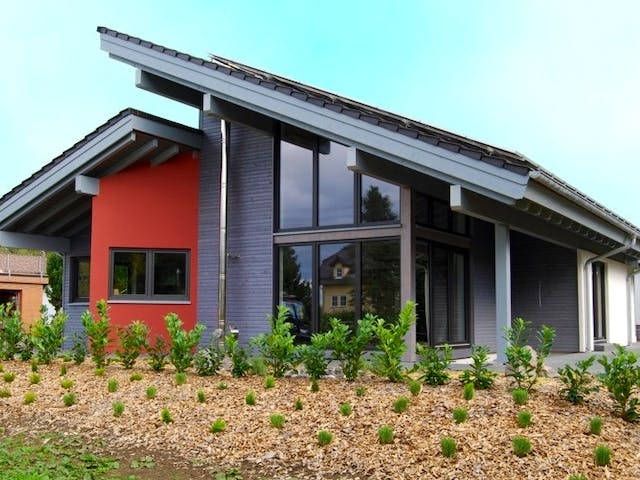 Fertighaus Energie-Plus-Haus von TIROLIA Ausbauhaus ab 105800€, Pultdachhaus Außenansicht 1
