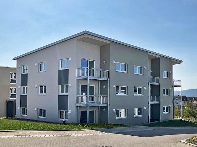 Fertighaus Mehrfamilienhaus in Oberrot von Fertighaus WEISS - Mehrfamilienhäuser, Pultdachhaus Außenansicht 3