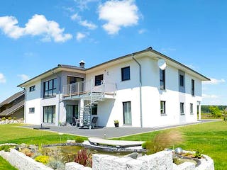 Fertighaus Mehrfamilienhaus Eris von FINGERHUT-HAUS Zwei- & Mehrfamilienhäuser, Stadtvilla Außenansicht 2