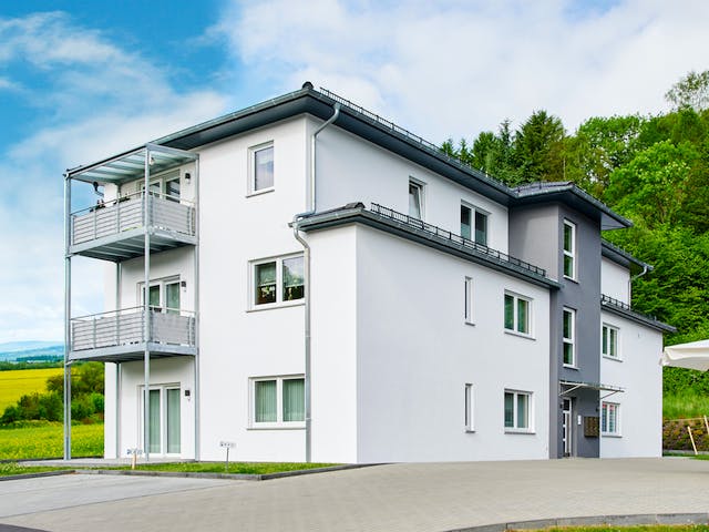 Fertighaus Mehrfamilienhaus mit 6 Wohneinheiten von FINGERHUT-HAUS Zwei- & Mehrfamilienhäuser, Stadtvilla Außenansicht 2