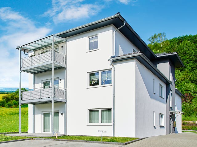 Fertighaus Mehrfamilienhaus mit 6 Wohneinheiten von FINGERHUT-HAUS Zwei- & Mehrfamilienhäuser, Stadtvilla Außenansicht 4