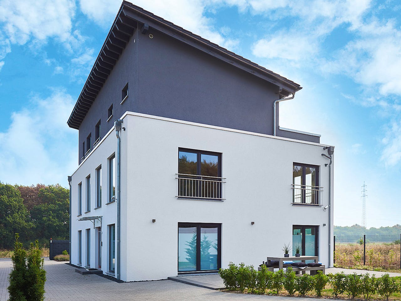 Fertighaus Tasko von Fingerhut Haus Schlüsselfertig ab 973096€, Pultdachhaus Außenansicht 1