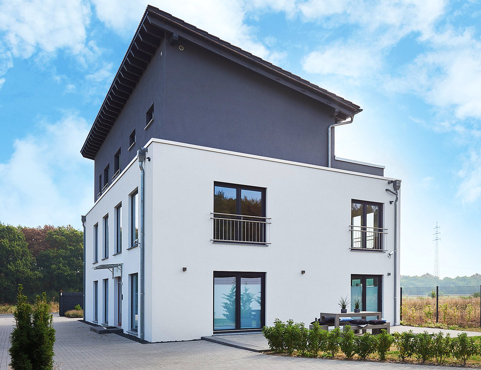 Fertighaus Tasko von FINGERHUT-HAUS Schlüsselfertig ab 970861€, Pultdachhaus Außenansicht 1