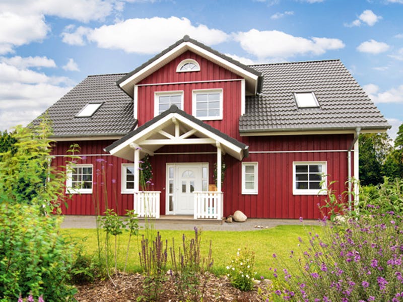 Holzhaus mit roter Fassade von Fjorborg
