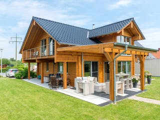 Blockhaus Münsterland von Fullwood Wohnblockhaus Ausbauhaus ab 400000€, Blockhaus Außenansicht 2