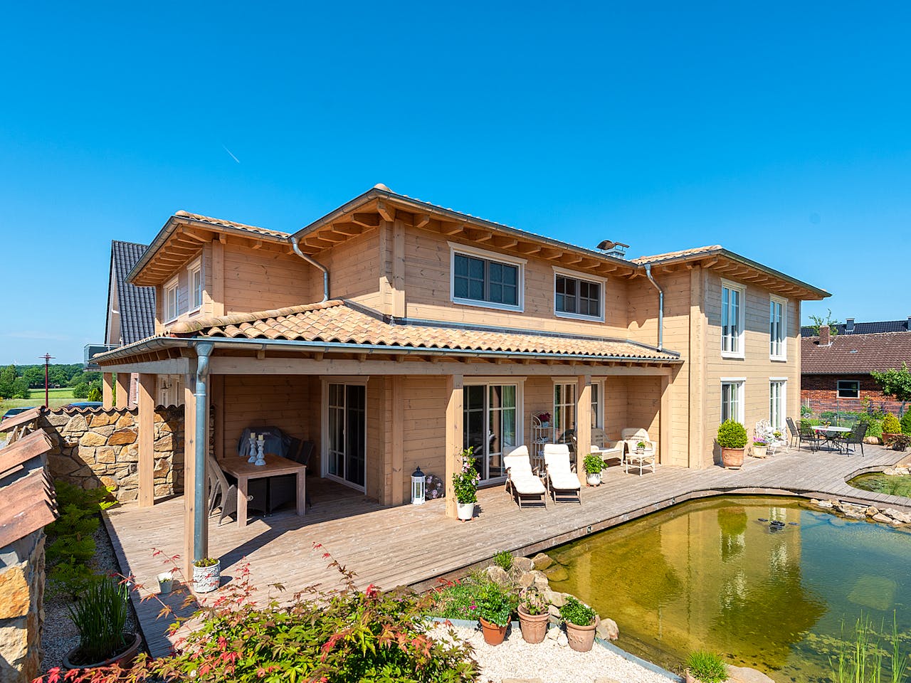 Blockhaus Provence von Fullwood Wohnblockhaus Ausbauhaus ab 660000€, Blockhaus Außenansicht 1