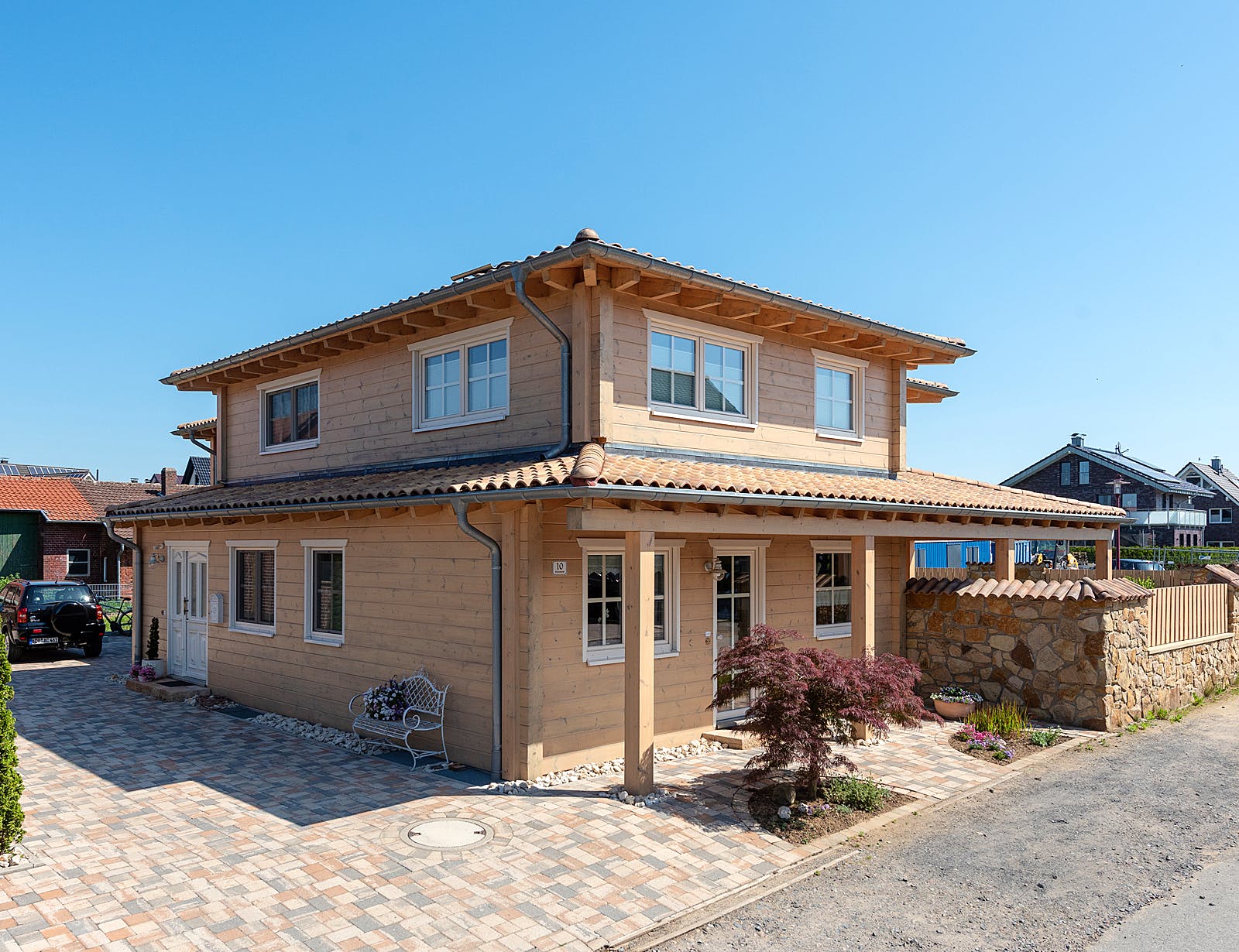 Blockhaus Provence von Fullwood Wohnblockhaus Ausbauhaus ab 500000€, Blockhaus Außenansicht 2