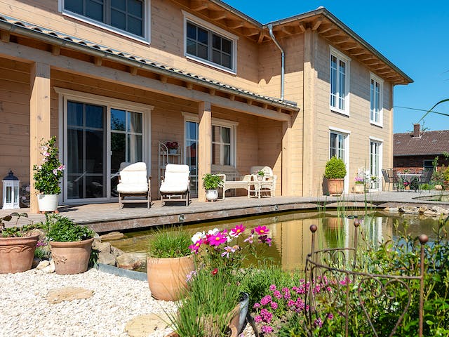 Blockhaus Provence von Fullwood Wohnblockhaus Ausbauhaus ab 500000€, Blockhaus Außenansicht 4