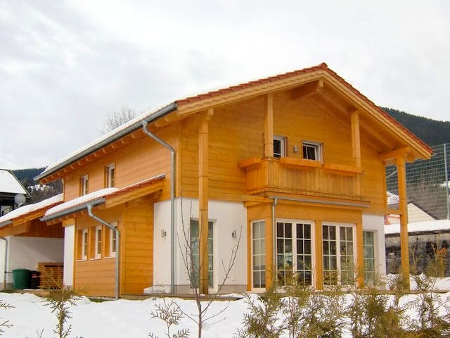 Fertighaus Garmisch von TIROLIA Ausbauhaus ab 127890€, Satteldach-Klassiker Außenansicht 1