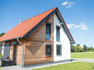 Fertighaus Kompaktes Einfamilienhaus für Kostenbewusste von Hausbau Heggemann Schlüsselfertig ab 350000€, Außenansicht 2