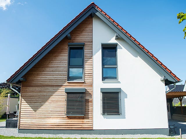 Fertighaus Kompaktes Einfamilienhaus für Kostenbewusste von Hausbau Heggemann Schlüsselfertig ab 350000€, Außenansicht 4