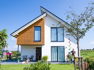 Fertighaus Versetztes Pultdach in Wellingholzhausen von Hausbau Heggemann Schlüsselfertig ab 450000€, Außenansicht 2