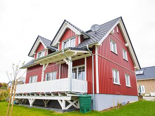 Fertighaus Rotes Schwedenhaus in Ostercappeln von Hausbau Heggemann Schlüsselfertig ab 410000€, Außenansicht 2