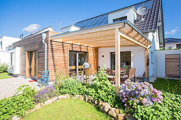Einfamilienhaus mit Wintergarten von Hausbau Heggemann