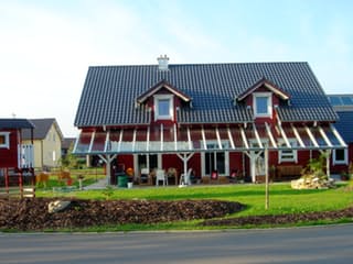 Fertighaus Heike von Holzhaus Rosskopf Schlüsselfertig ab 599000€, Blockhaus Außenansicht 4