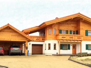 Fertighaus Hochalpe von TIROLIA Ausbauhaus ab 100965€, Blockhaus Außenansicht 1