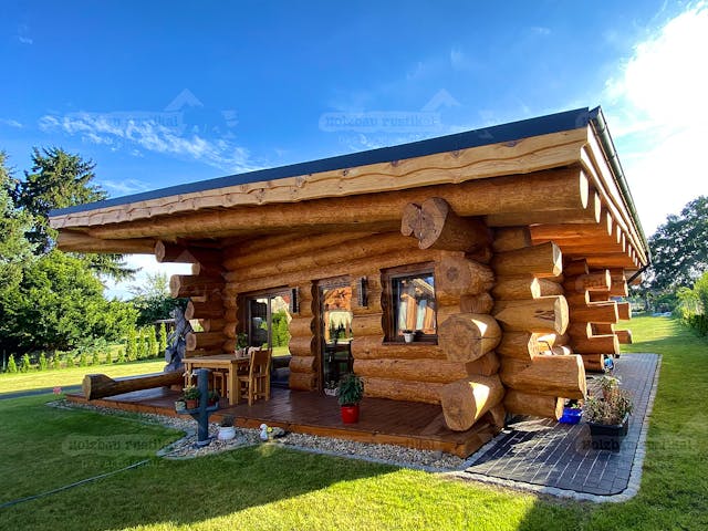 Blockhaus Blockhaus Ostsee von Holzbau rustikal - Blockhäuser Bausatzhaus ab 73756€, Pultdachhaus Außenansicht 2