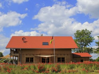 Fertighaus Jubiläumshaus von BayernBlock Schlüsselfertig ab 250000€, Blockhaus Außenansicht 11