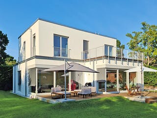 Massivhaus Freie Planung - Haus 3 von KOSIMA HAUS, Cubushaus Außenansicht 1