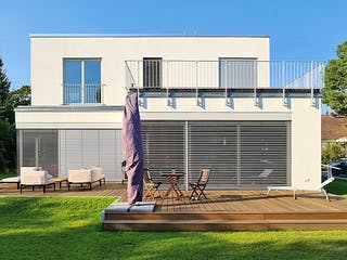 Massivhaus Freie Planung - Haus 3 von KOSIMA HAUS, Cubushaus Außenansicht 2