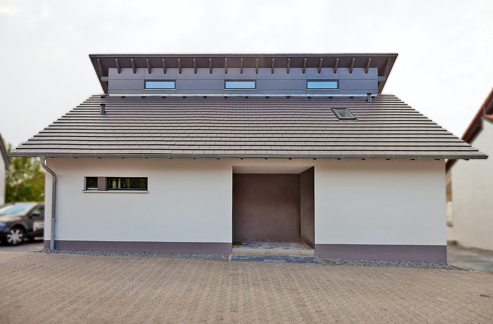 Massivhaus Freie Planung - Haus 5 von KOSIMA HAUS, Pultdachhaus Außenansicht 2