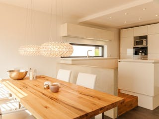 Massivhaus Freie Planung - Haus 5 von KOSIMA HAUS, Pultdachhaus Innenansicht 1